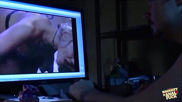 A provocative redhead demonstrates her promiscuity by engaging in sexual activity with her photographer during a session