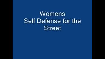 Karate woman ballbusting man