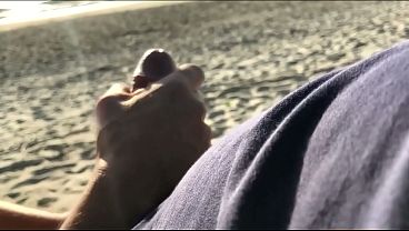 Anal creampie on a public beach