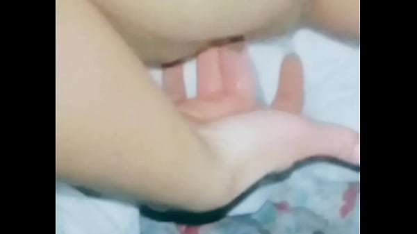 Rubbing her pussy
